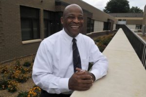 KCDC CEO profile of Alvin Nance. Standing in the court yard of the new senior residences at Eastport. (J. Miles Cary/News Sentinel)