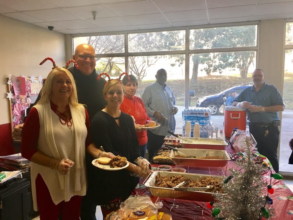 Cagle Terrace property manager, Darlene Farmer, staff and volunteers serve lunch to residents at the annual Holiday/Resident Appreciation Party on Thursday, Dec. 22. Approximately 100 residents attended the event. From left to right are Farmer, Scott Pfieffer, Kimberlyn Thomson, Janice Holmes, Broderick Kelly and Larry Medley. 