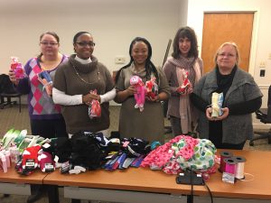 KCDC staff members assemble Valentine’s Day gift packages for senior residents at the main office on Feb. 10. Pictured from left: Lisa Weddle, Rosetta Brown, Shana Love, Beth Bacon and Cathe Lee. 