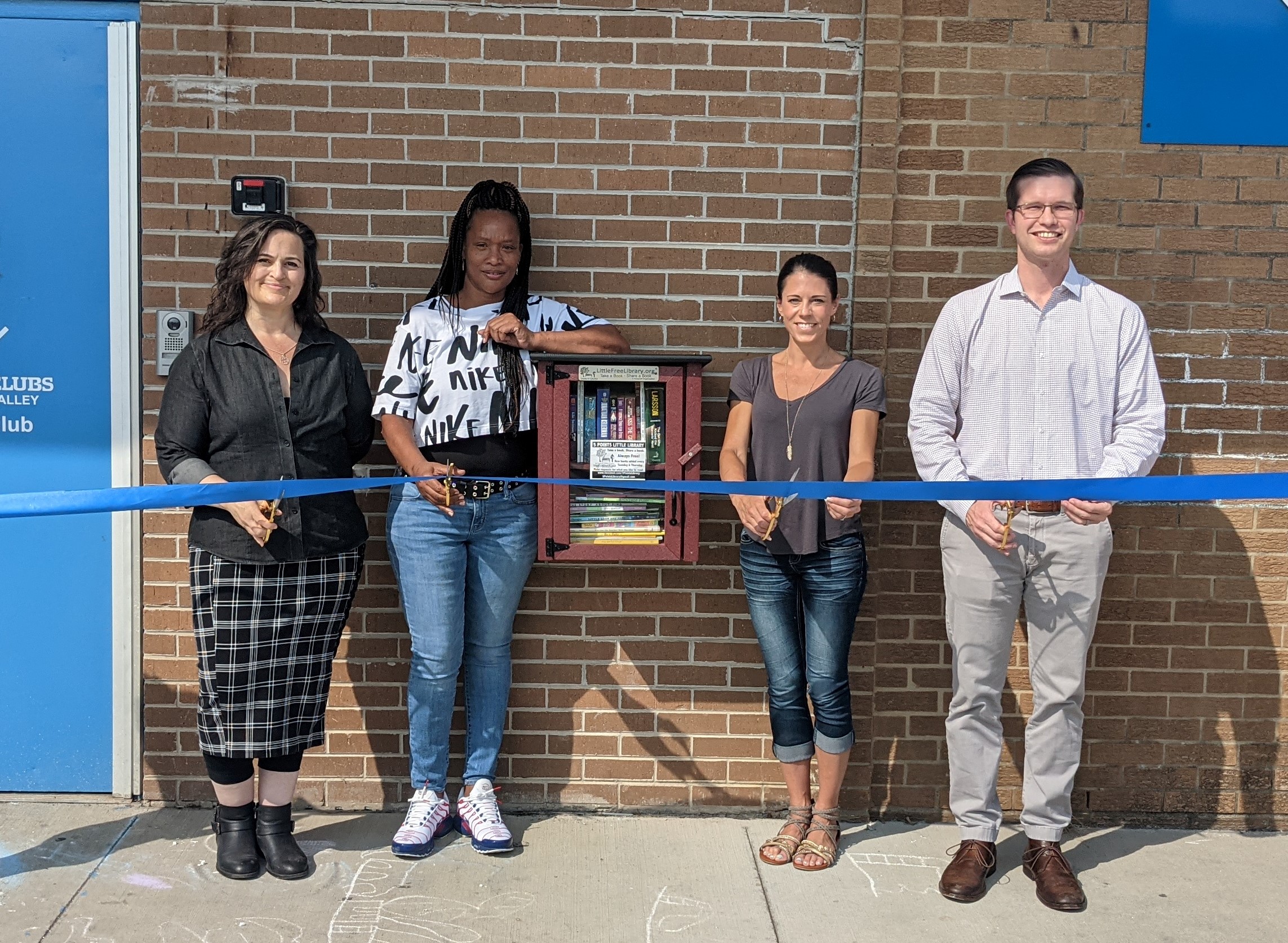 Featured image for “Volunteers open Little Free Library for Five Points community”